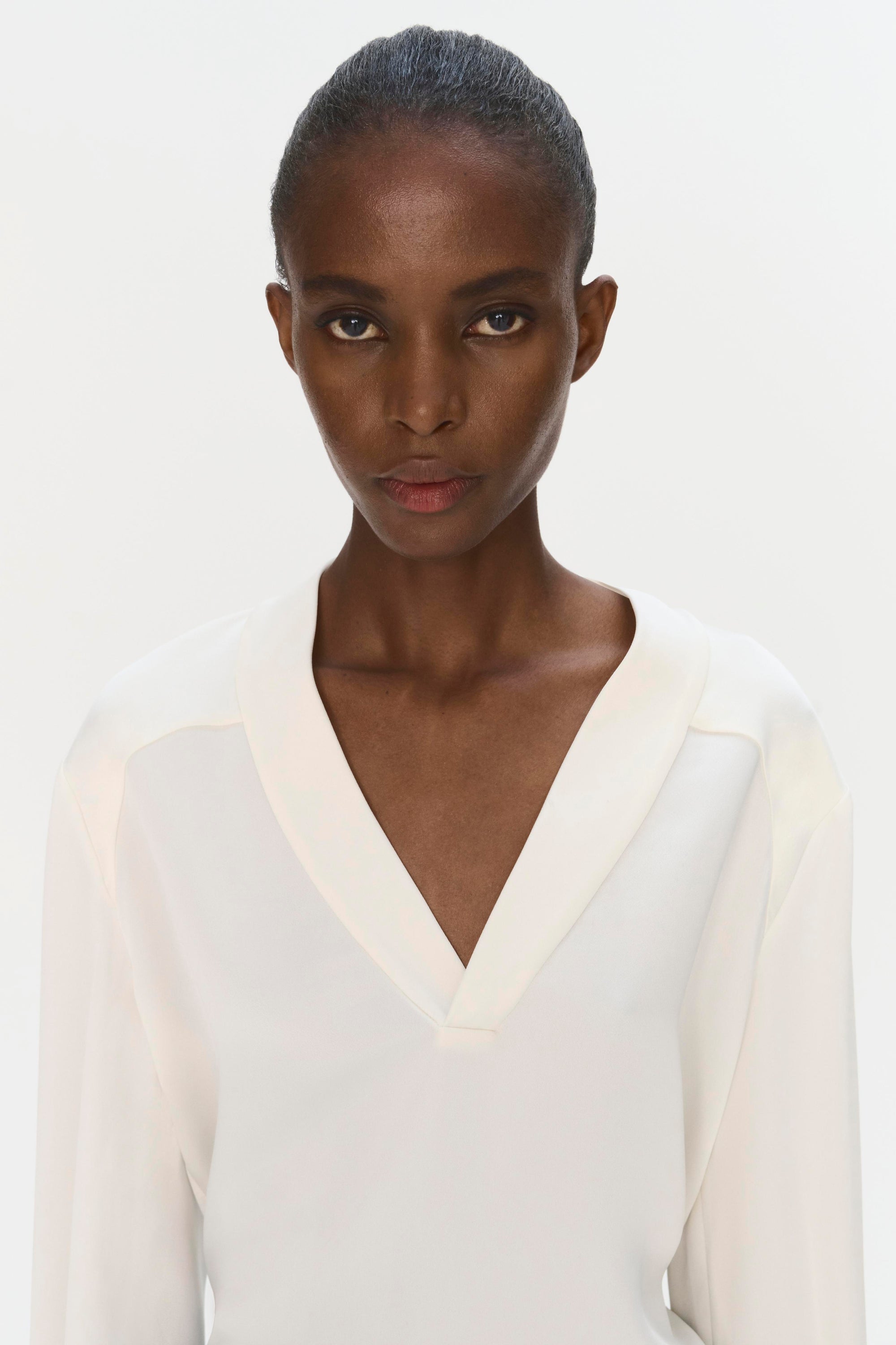 SIMKHAI Maisey Long Sleeve V Neck Blouse in Ivory Blond Genius