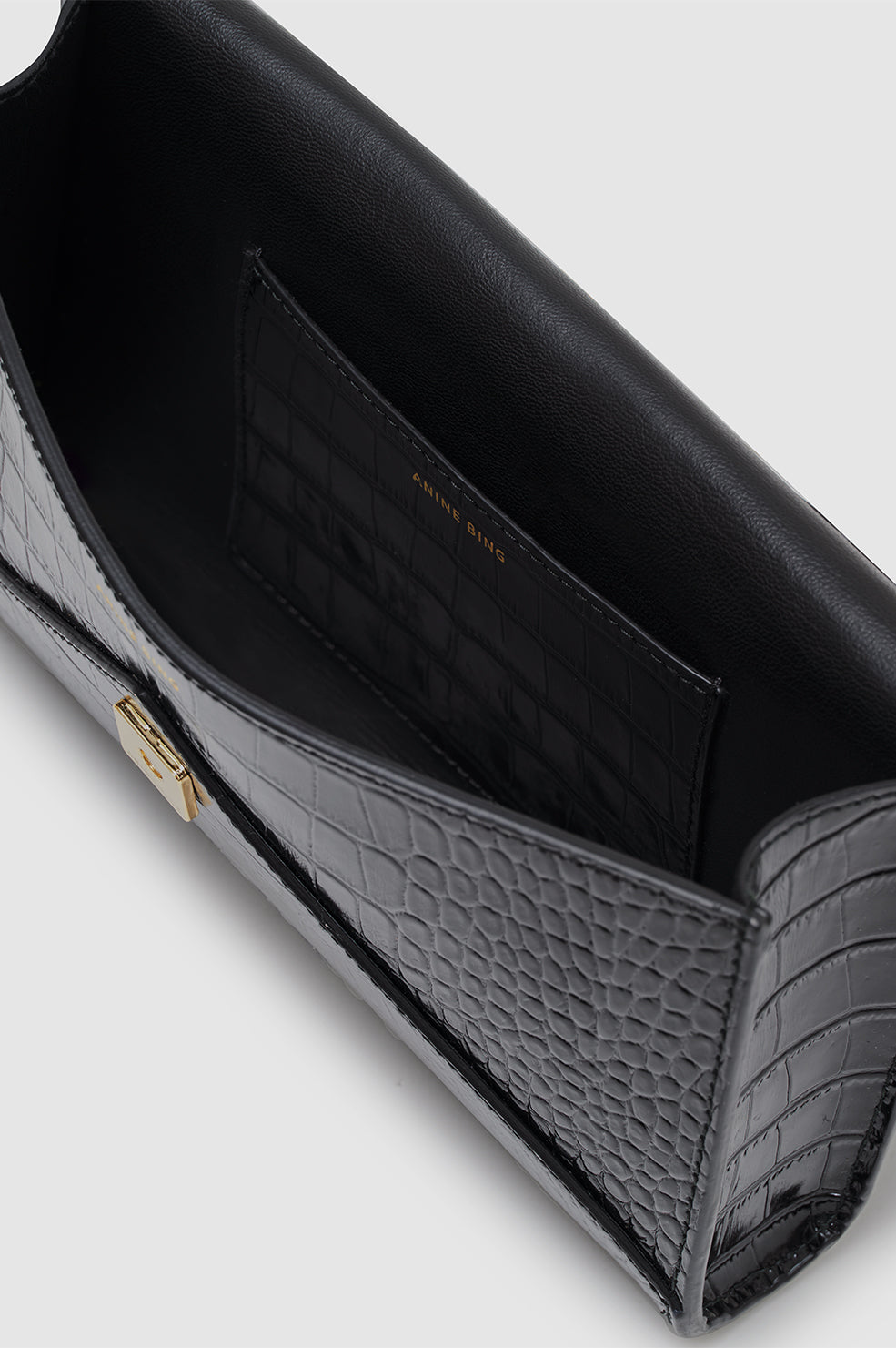 Anine Bing - Small Elly Clutch in Black Embossed