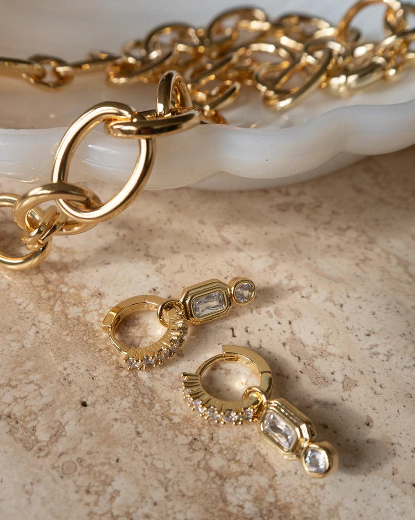 LUV AJ - Pyramid Bezel Huggies in Gold
