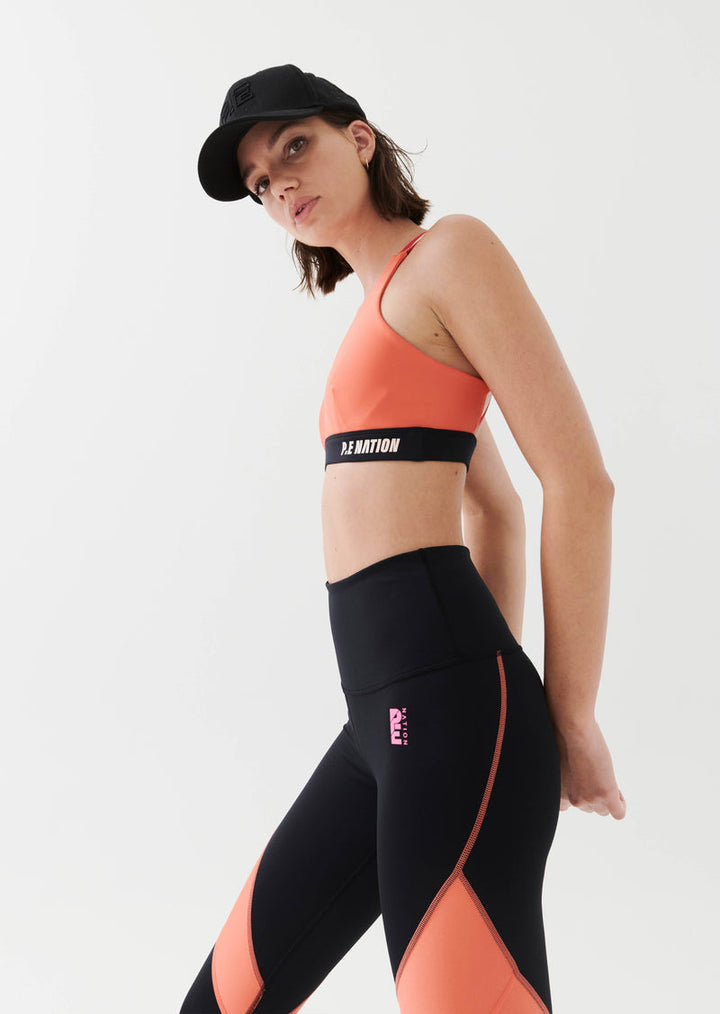 P.E NATION - High Press Sports Bra in Persimmon