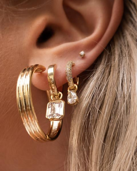 LUV AJ - Brigitte Bezel Huggies in Gold Jewelry