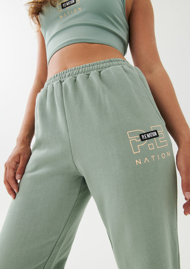 P.E NATION - Grand Stand Track Pant in Iceberg Green