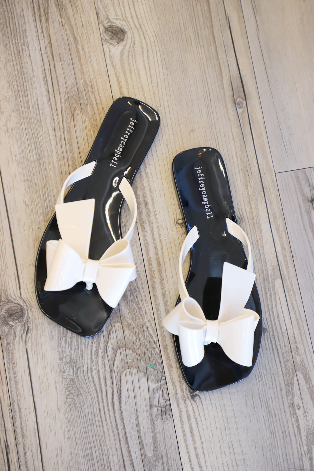 Jeffrey Campbell - Sugary Flat Jelly Bow Thong in Cream Shiny Black Shiny Shoes