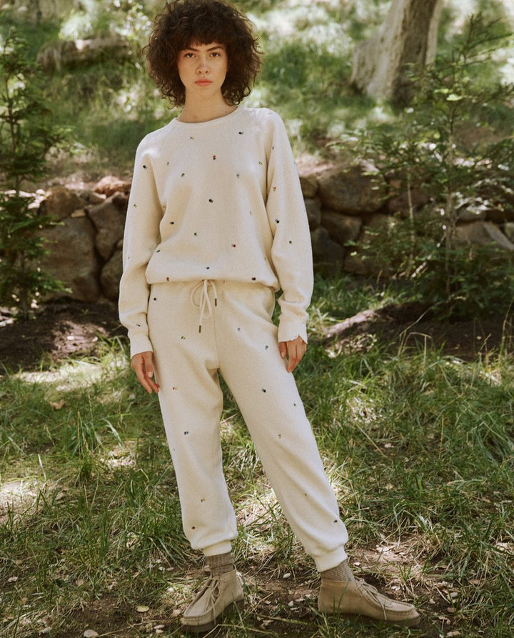 The Great - The Sherpa College Sweatshirt w/ Ditsy Floral Embroidery in Washed White