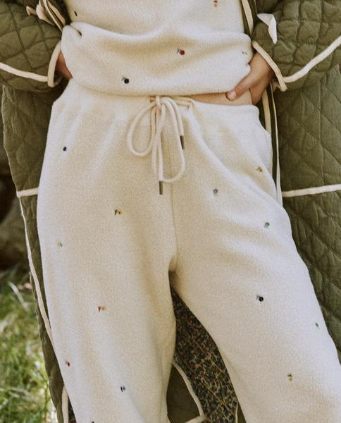 The Great - The Sherpa College Sweatshirt w/ Ditsy Floral Embroidery in Washed White